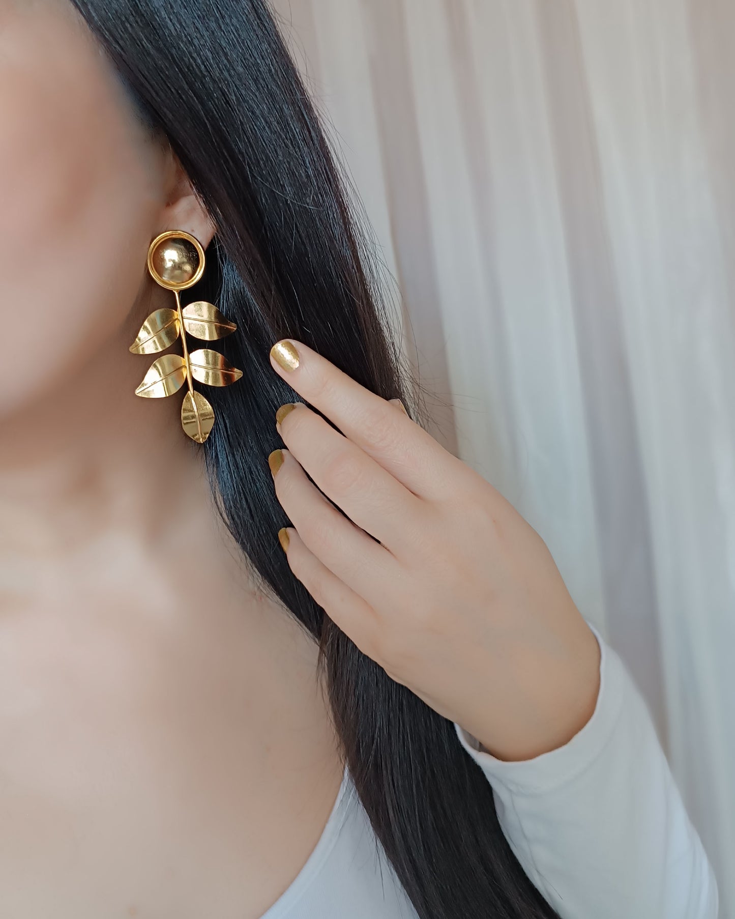 Aretes largos rama hojas Dina