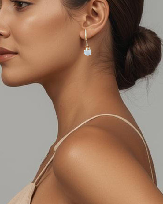 Aretes en bronce y cuarzo cristal, Fernanda