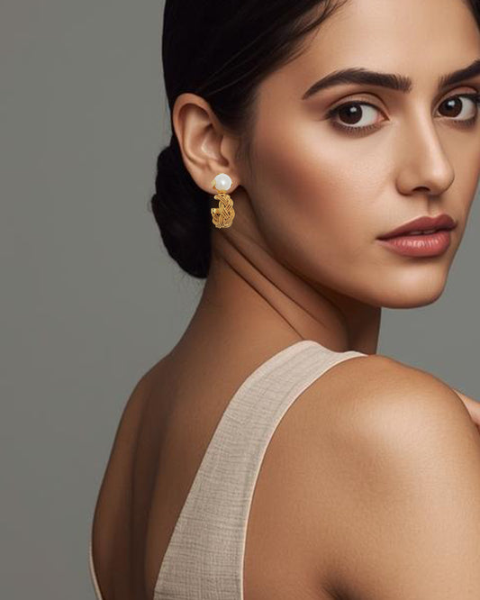 Candongas trenzadas, Olivia