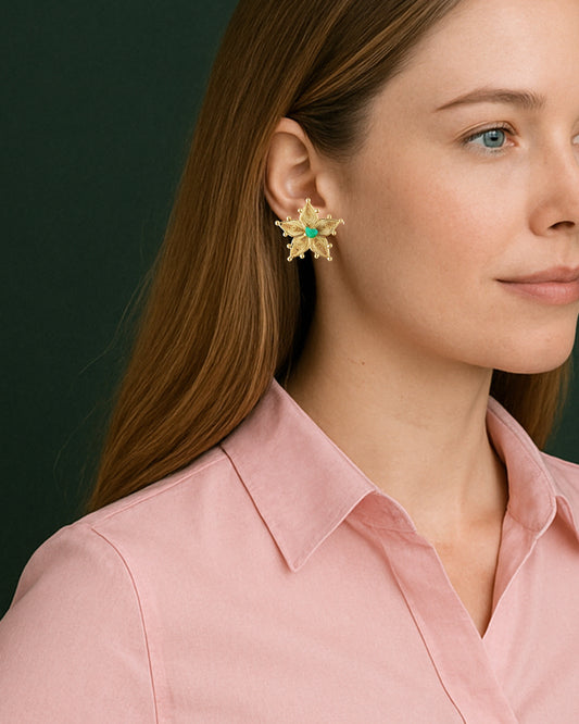 Aretes estrella estelar con esmeralda