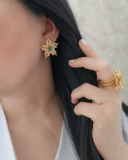 Aretes estrella estelar con esmeralda