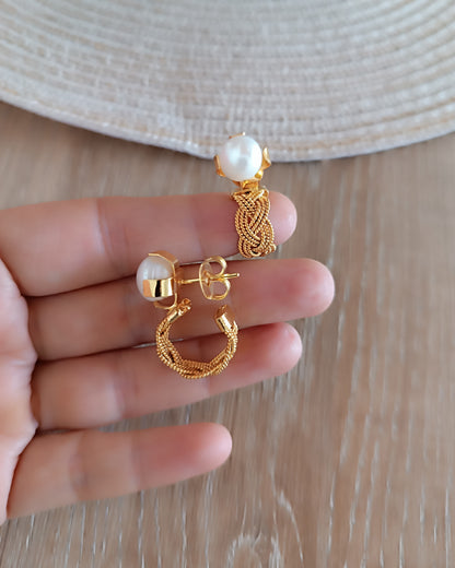 Candongas trenzadas, Olivia